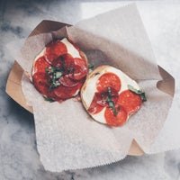 Photo taken at Black Seed Bagels by Henry W. on 4/22/2015