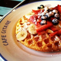 Photo taken at Café Gitane by C W. on 12/24/2012