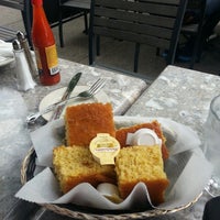 Photo taken at Sylvia's Restaurant by Lorenzo C. on 5/18/2013