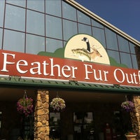 What kind of products are sold at Fin Feather Fur Outfitters?