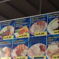 Photo taken at Muara Restaurant by Cindy O. on 12/10/2012