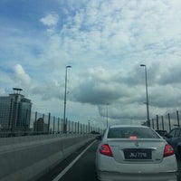 Photo taken at Johor-Singapore Causeway by Teo T. on 12/8/2012