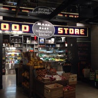 Photo taken at Gotham West Market by Betsy F. on 11/23/2013