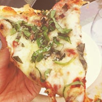 Photo taken at Bazbeaux Pizza by Laura B. on 7/20/2013