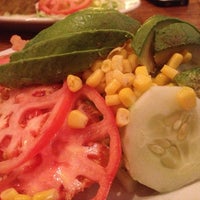 Photo taken at Malecon Restaurant II by Kirsten P. on 6/22/2013