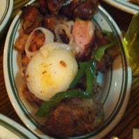 Photo taken at Malecon Restaurant II by Vicki C. on 10/3/2012