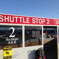 Photo taken at Shuttle Stop 2 by Nate M. on 4/23/2013