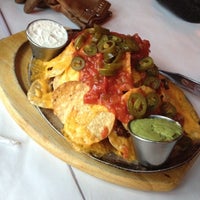 Photo taken at The Paris Cafe by Nicole D. on 12/18/2011