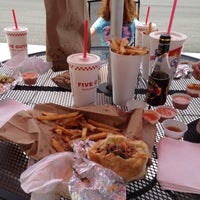 Photo taken at Five Guys by Adam L. on 5/12/2012