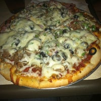 Photo taken at Bazbeaux Pizza by Teri D. on 8/28/2011