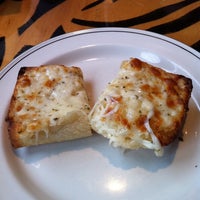 Photo taken at Bazbeaux Pizza by Emily C. on 9/19/2011