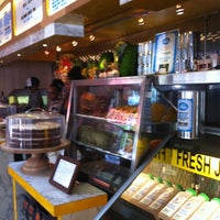 Photo taken at Miss Lily&amp;#39;s &amp;amp; Melvin&amp;#39;s Juice Box by Catherine M. on 8/21/2012