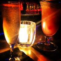 Photo taken at Flûte Midtown by Rachel D. on 7/25/2012