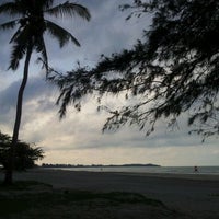 Photo taken at Tanjung Balau Beach by Deja M. on 3/6/2012