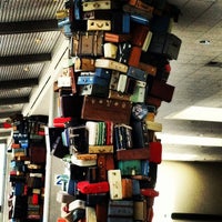 Photo taken at Baggage Claim by Chellie d. on 8/2/2012