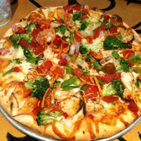 Photo taken at Bazbeaux Pizza by Melissa F. on 9/5/2012