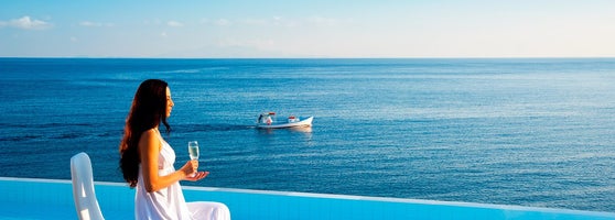 Petasos Beach Resort Spa Luxury Hotel In Μύκονος A Gl Of Champagne The View Aegean Sea And Warmth Late Afternoon Sun Your Experience At Petasos Beach Resort Spa Will Stay With You