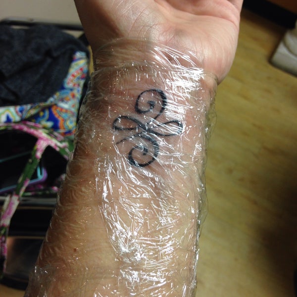 Stone Age Tattoo - Tattoo Parlor